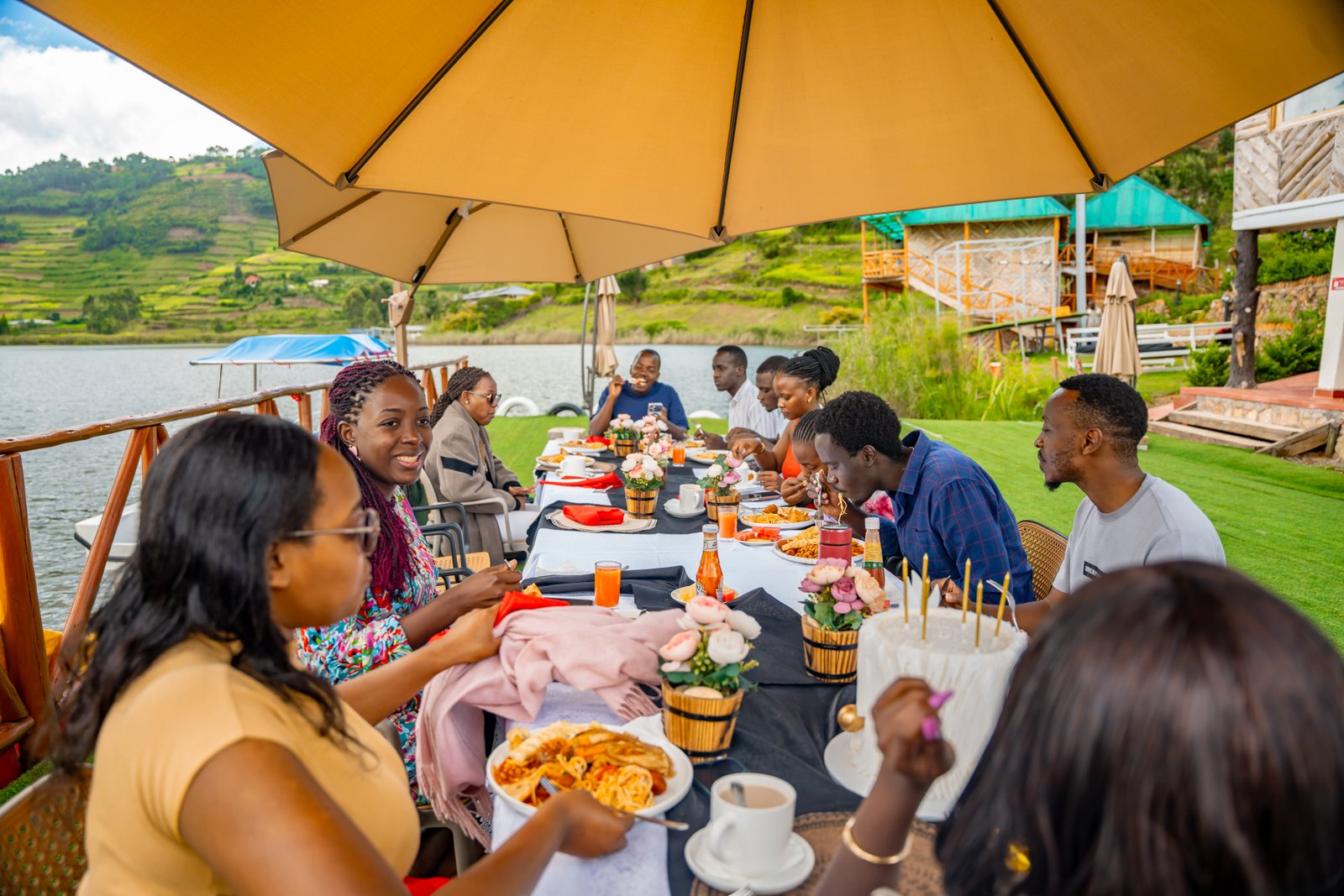 Dining at the site of the waters of Bunyonyi