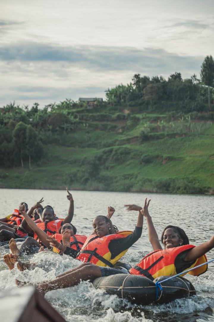 Tubing across the waters of Lake Bunyonyi